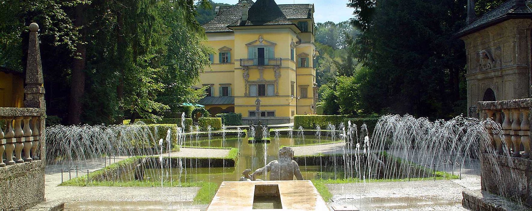 Hellbrunn Palace & Trick Fountains - View of the Prince's Table with the Palace in the Background