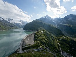 Kaprun Alpine Reservoirs - Panoramic view of reservoir with mountain panorama