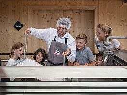 Salzwelten Salzburg - Children observe salt in its formation in the BAD ISCHLER Salz-Manufaktur (salt manufactory)